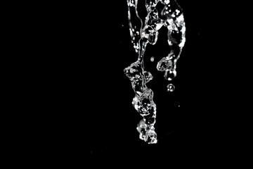 Water splash isolated on black background