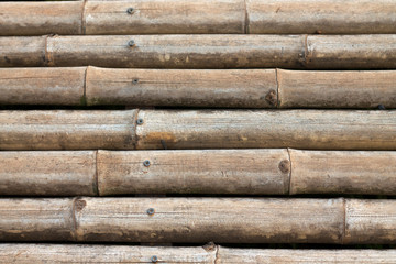Obraz premium background and​ texture​d Brown bamboo sticks are arranged together. Natural materials used as floor or wall for text 