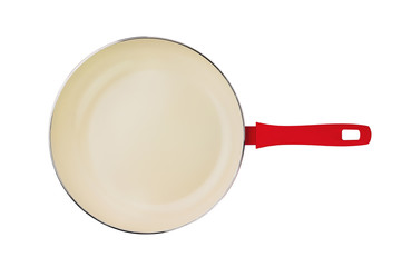 One empty red aluminum deep fry pan with non-stick beige coating and plastic handle isolated on white background. Top view