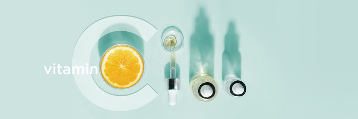 Serum with vitamin C, concept design. Beauty therapy, body care. Minimalism Flat lay.