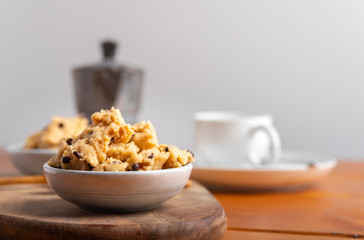 a serving of homemade cookie dough on a white background.