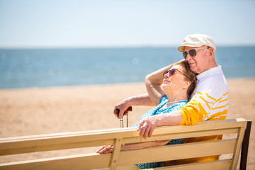 family, age, travel, tourism and people concept - Senior couple rest at tropical resort near sea