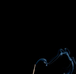 Abstract smoke of joss stickon black background