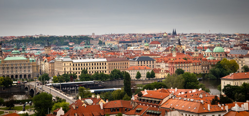 Panoramic top view of Prague old town with historic buildings and Vltava river,
