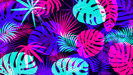 Creative background with bright tropical leaves with an overlap effect