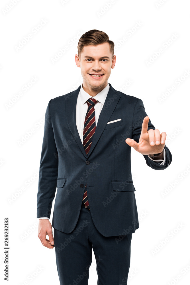 Wall mural positive businessman pointing with finger isolated on white