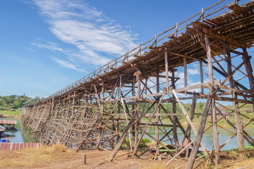 view of Mon bridge with blue sky background know as wooden bridge longest in Thailand, Sangklaburi, Kanchanaburi, Thailand.