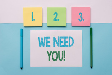 Text sign showing We Need You. Business photo text asking someone to work together for certain job or target Note papers and stationary placed sideways on top of softhued backdrop