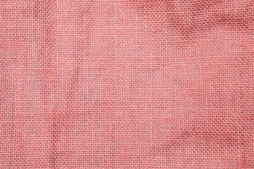 Abstract closeup red hessian fabric texture background, blank red fabric pattern background