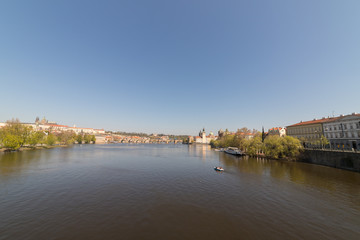 A river between the street in Prague