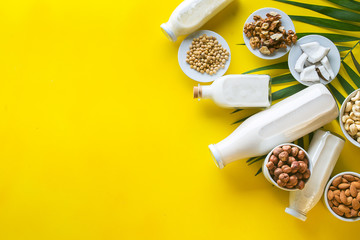 many kinds of vegetable milk in glass jars