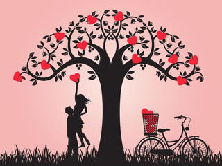 Concept of valentine day , two enamored beside the bicycle and tree with pink background,paper art and craft style.