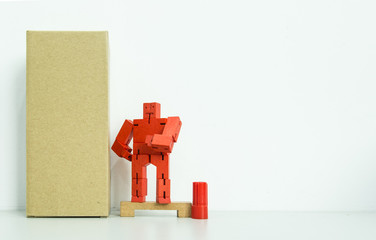 wooden toy robot display on white background