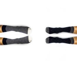 Feet wearing sock isolated on white background