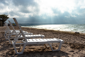 chaise lounges on the sea
