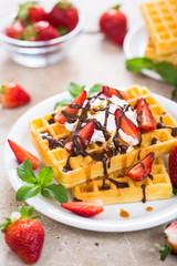 Fresh homemade waffles with strawberries 