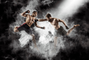 MMA boxers fighters fight in fights without rules - obrazy, fototapety, plakaty