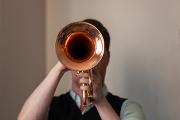 Trumpeter with trumpet in hands