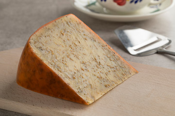  Piece of old mature cumin cheese