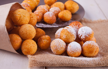 Small balls of freshly baked homemade cottage cheese doughnuts