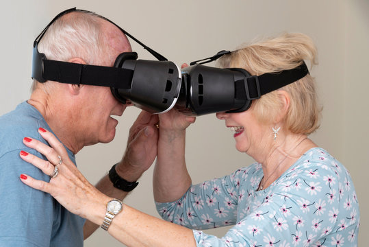 Portsmouth UK, May 2019. Elderly couple having fun wearing virtual reality goggles