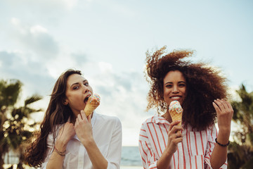 Friends enjoying eating ice cream