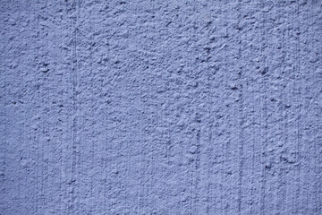 Rustic white washed wall concrete texture background painted in blue color - Close up image