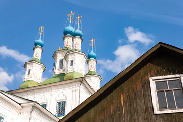 Beautiful Church of Totma, Russia sunny autumn day on nature background