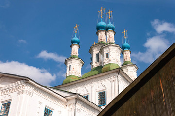 Beautiful Church of Totma, Russia sunny autumn day on nature background