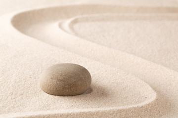 Fototapeta na wymiar harmony purity and spirituality background, zen meditation stone and sand garden