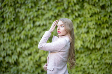 Fototapeta premium Twin Russian Girl walking in Day on a Luxury Park