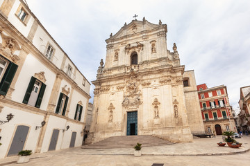 Fototapeta na wymiar View of the Basilica of San Martino in Baroque architecture in Piazza Plebiscito, Martina Franca.