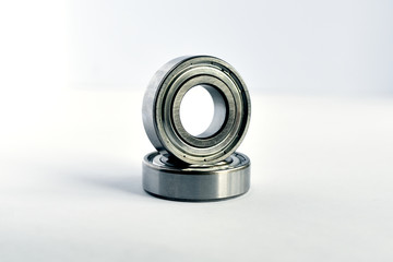 rolling bearing placed vertically on the same bearing lying on the surface