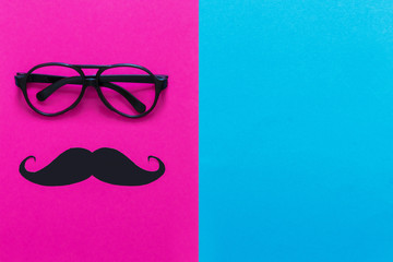 Father's Day. Bright holiday greeting card with the attributes of men mustache glasses on a bright...