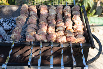 Barbecue on the grill. Cooking meat on the grill.