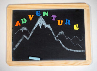 Hiking adventure message on chalkboard