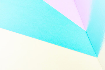 Pink-yellow-green background with a mirror reflection. Abstract image with pastel colors. Summer concept. Copy space. Design, minimalism.