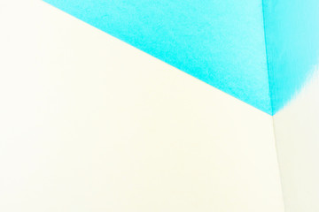 Yellow-green background with a mirror reflection. Abstract image with pastel colors. Summer concept. Copy space. Design, minimalism.