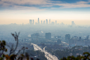LOS ANGELES, CALIFORNIA - FEB 13: Sunrise towards a smog ridden Los Angeles downtown.  LA is well...