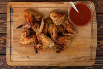 Hot and Spicy Chicken Wings with red sauce