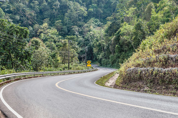 Road and mountain under the blue sky  in Thailand