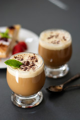 Coffee cold drink with vanilla ice cream and espresso. Deliciouse summer refreshing drink in glass.