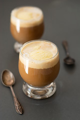 Ice cream and coffee espresso. Deliciouse summer refreshing drink in glass.