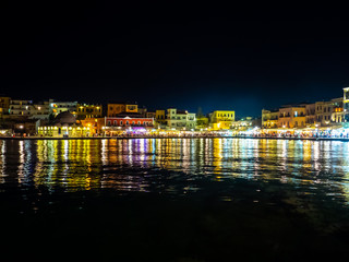 Fototapeta na wymiar Night scene of amazing Chania port - old town by the sea - Crete, Greece