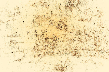 Vintage yellow background. Rough painted wall of aspen gold color. Imperfect plane of golden colored. Uneven old decorative toned backdrop of yellow tint. Texture of gold hue. Ornamental stony surface