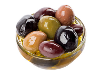 Bowl of different types of olives and olive oil