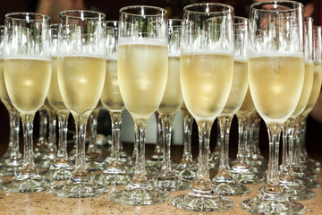 glasses served with champagne, to make a toast at a social event.