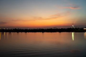 Fototapeta na wymiar The sky in evening, the sunset over lake background
