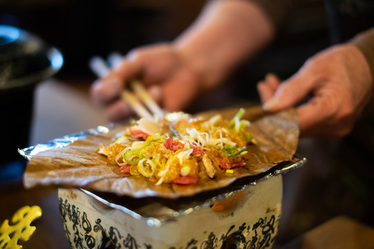 Charcoal grilled hida beef on oba leaf with miso and vegetables, traditional food at Takayama, Japan.