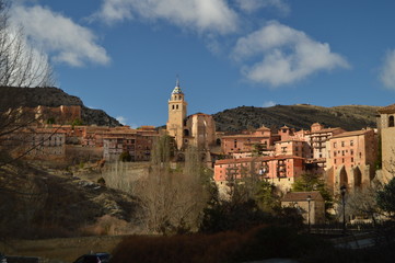 Fototapeta premium December 28, 2013. Albarracin, Teruel, Aragon, Spain. Views Of The Villa With The Savior Cathedral And Its Hanging Houses On A Mountain. History, Travel, Nature, Landscape, Vacation, Architecture.